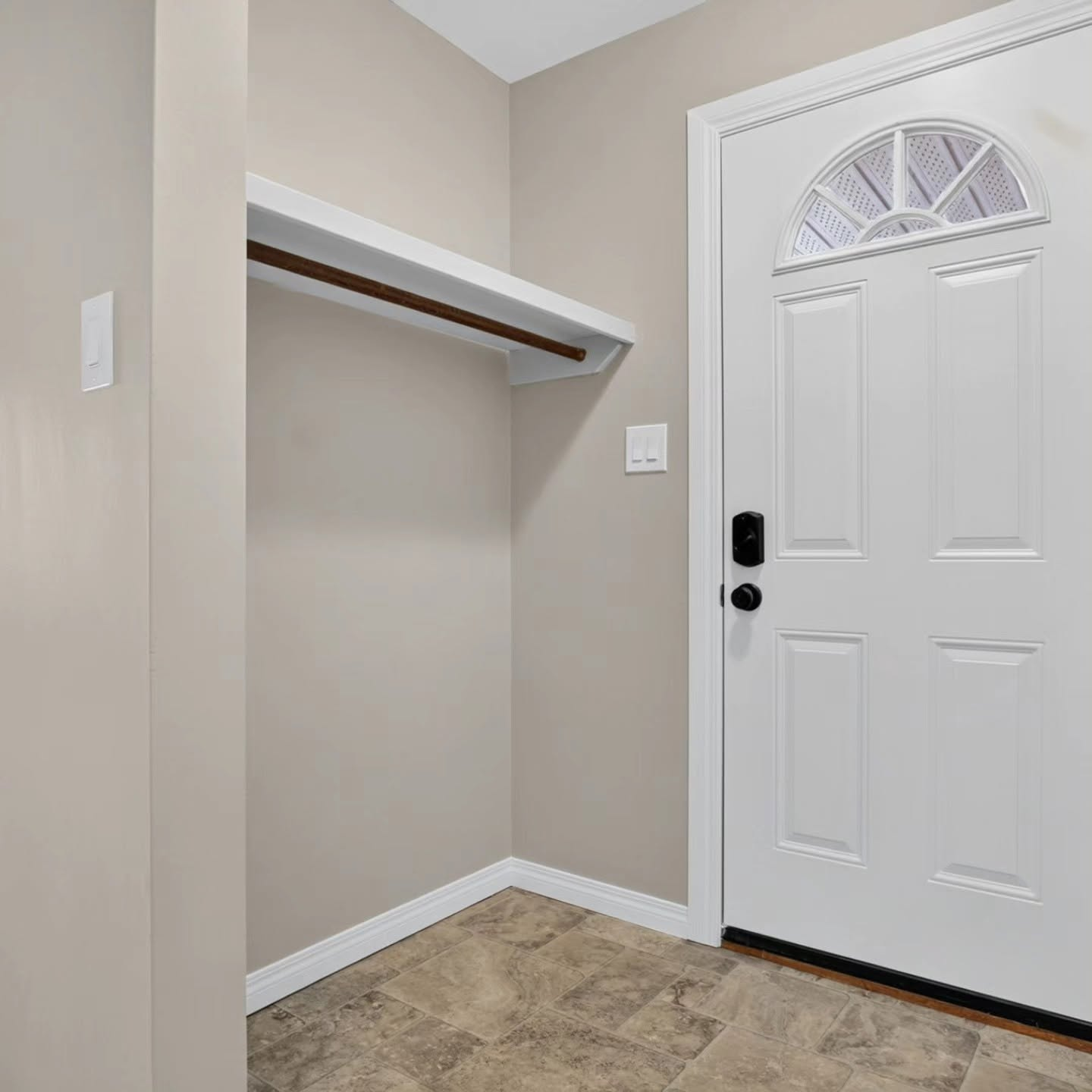 Exterior painting project in Calgary by Lady J's Painting & Decorating Exterior entry door and trim painting by Lady J's Painting & Decorating in Calgary